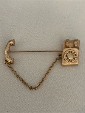 Vintage Avon gold tone rotary dial telephone stick pin brooch